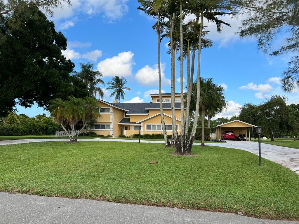 Photo of 10400 W Tara Boulevard, Boynton Beach, FL 33437 (MLS # B26034992)