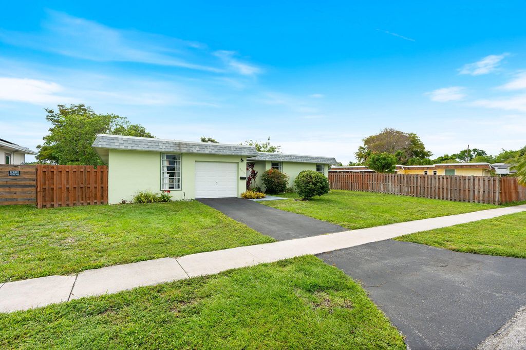 Photo of 7815 NW 68th Terrace, Tamarac, FL 33321 (MLS # B26024607)