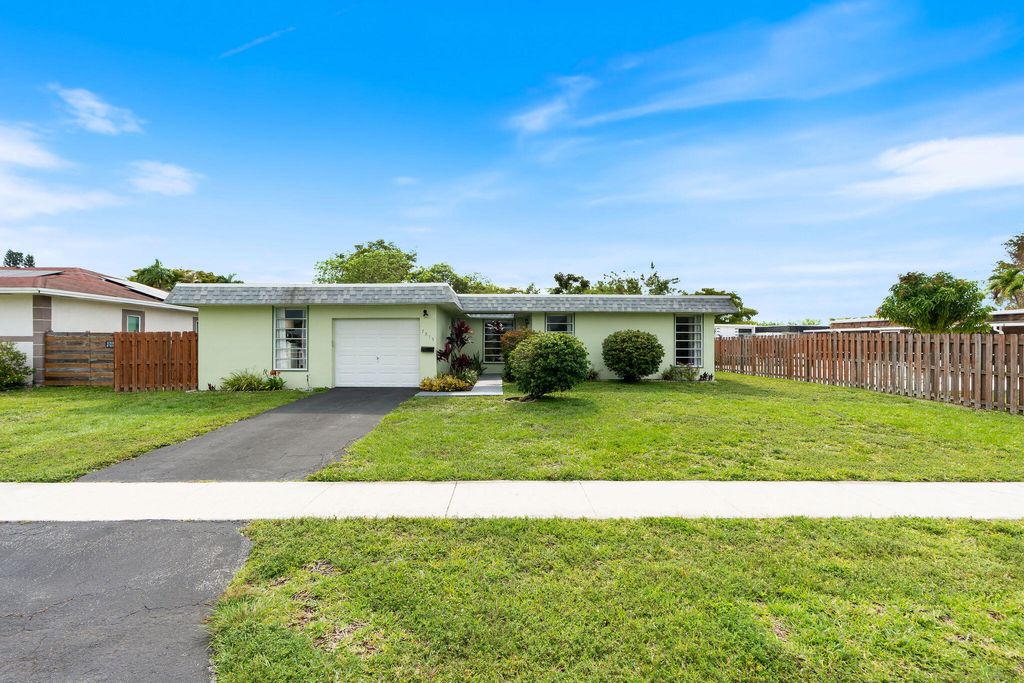 Photo of 7815 NW 68th Terrace, Tamarac, FL 33321 (MLS # B26024607)