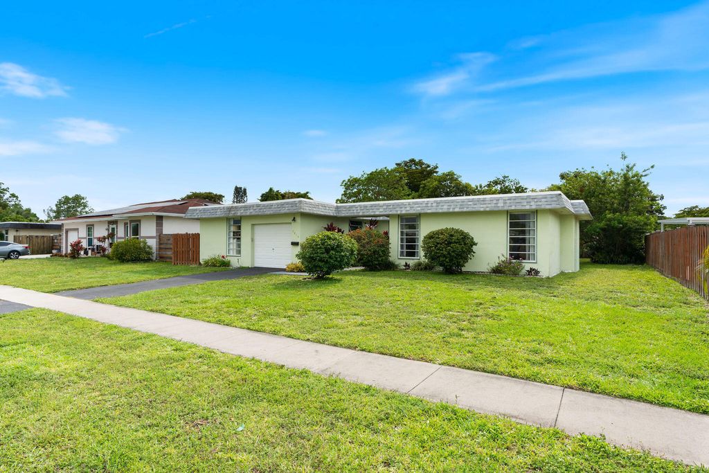 Photo of 7815 NW 68th Terrace, Tamarac, FL 33321 (MLS # B26024607)