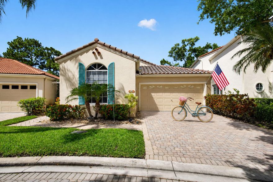 This PGA National Resort home in the highly sought after Villa d' Este community offers 3 bedrooms, 2 baths, and a 2-car garage, with views of the Palmer golf course. It's ideally located for walks to the community pool and PGA Resort Club restaurants, though resort memberships are optional. Outdoor spaces include a lanai for shaded mornings and sunset gatherings, plus an expanded open patio for extra seating and grilling. The two-car garage features a stand-alone HVAC system installed in 2024. For added comfort, the front door entrance was enclosed with a custom screen structure in 2025, and all door locks are professionally installed Schlage electronic systems. Villa d' Este is an Italian-themed community known for its paved leafy streets, park-like piazzas with seating and fountains,  The HVAC system was installed in the garage in 2023 for a custom car.The entire garage has been renovated and ready for custom storage units.