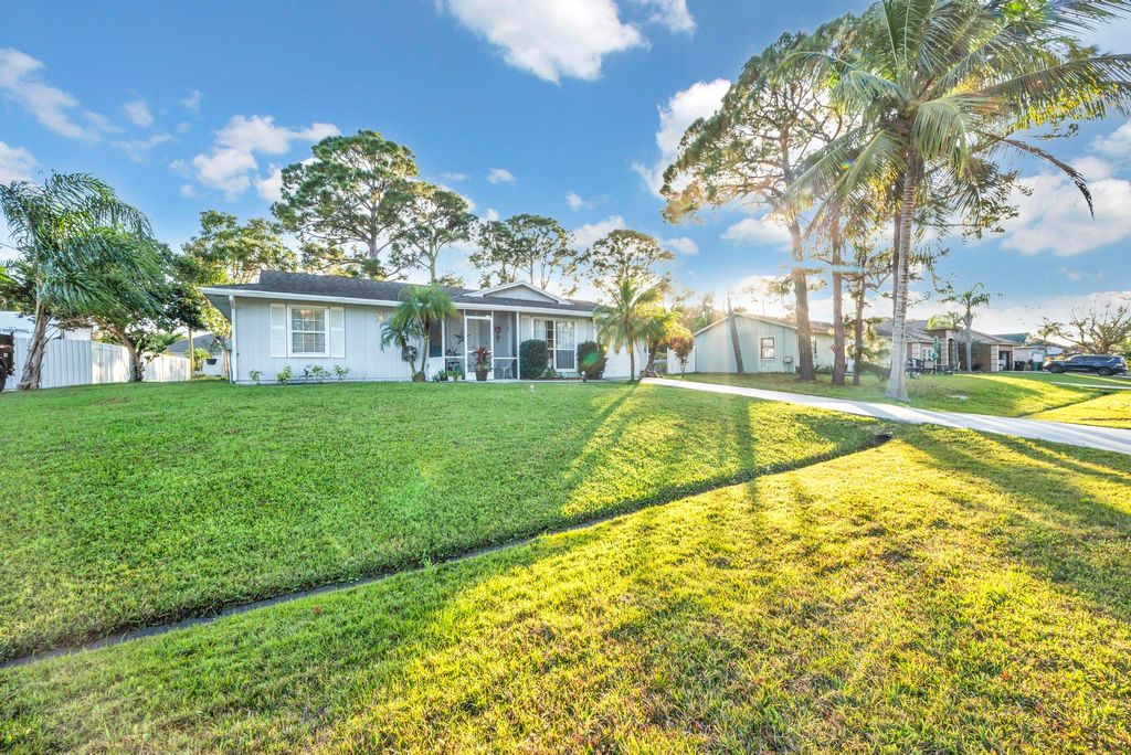 Photo of 1322 SW Crest Avenue, Port St Lucie, FL 34953 (MLS # R10862689)