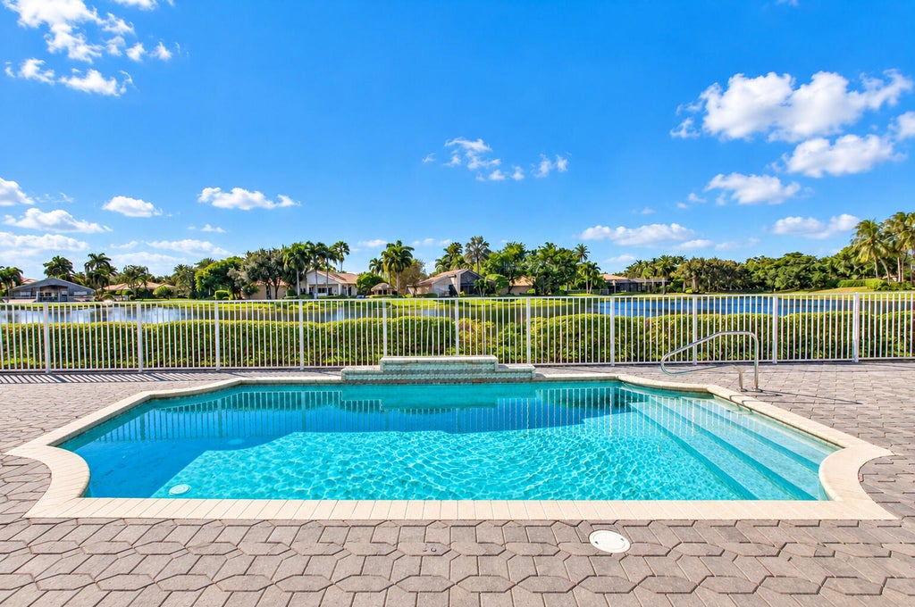 Photo of 7657 ROYALE RIVER Lane, Lake Worth, FL 33467 (MLS # B26092929)