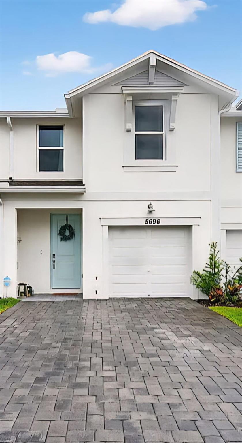 This home is better than new construction! Built in 2024 located in the highly sought after community of Edgewater Pointe. A rated schools and minutes to the beach and downtown Stuart. Immaculate 3/2 townhome, Elegant brushed tile flooring downstairs and AquaGuard(r) waterprooflaminate flooring upstairs - stylish, durable, and pet/kid-friendly,custom closets, honeywell home alarm. Complete hurricane glass protection , one car garage , energy efficient , upgraded appliances.This townhouse is bright with vaulted ceilings offering 3 bedrooms and a loft for your office or play area. This home offers a lifestyle of comfort , security and convenience.