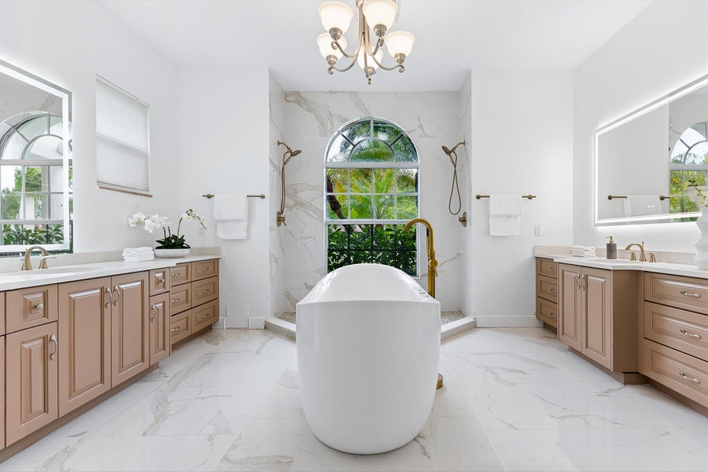Photo of 8717 ESTATE Drive, West Palm Beach, FL 33411 (MLS # B26070141)