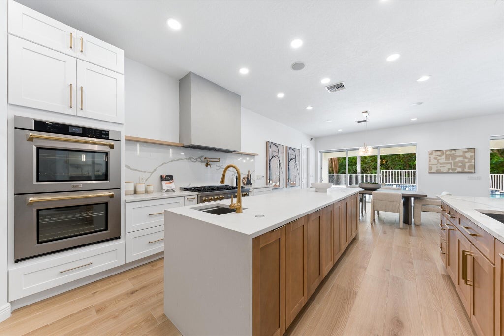 Photo of 8717 ESTATE Drive, West Palm Beach, FL 33411 (MLS # B26070141)