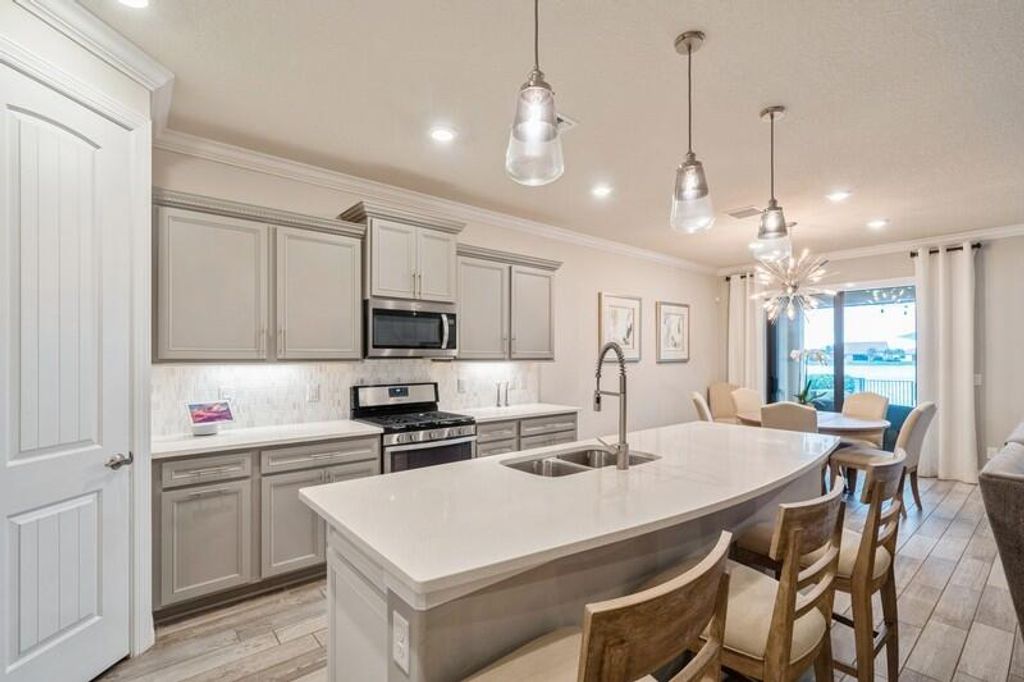 Photo of 124 SE Courances Drive, Port Saint Lucie, FL 34984 (MLS # R10957691)