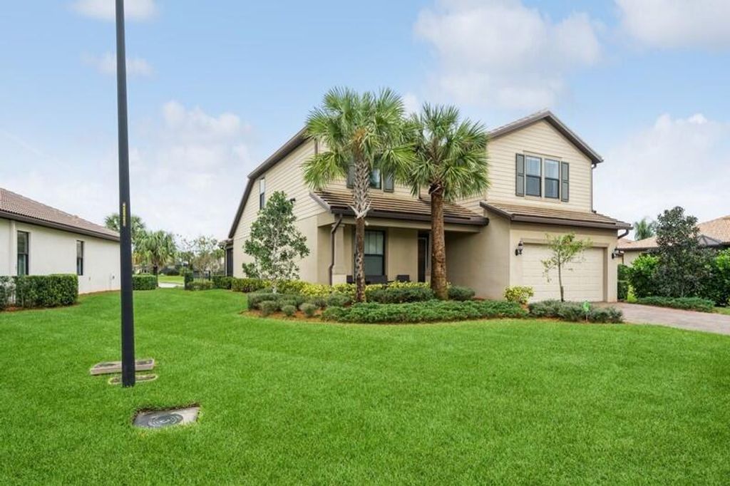 Photo of 124 SE Courances Drive, Port Saint Lucie, FL 34984 (MLS # R10957691)