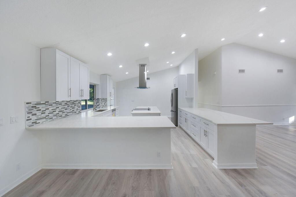 Photo of 14235 Peace River Way, West Palm Beach, FL 33418 (MLS # R10753039)