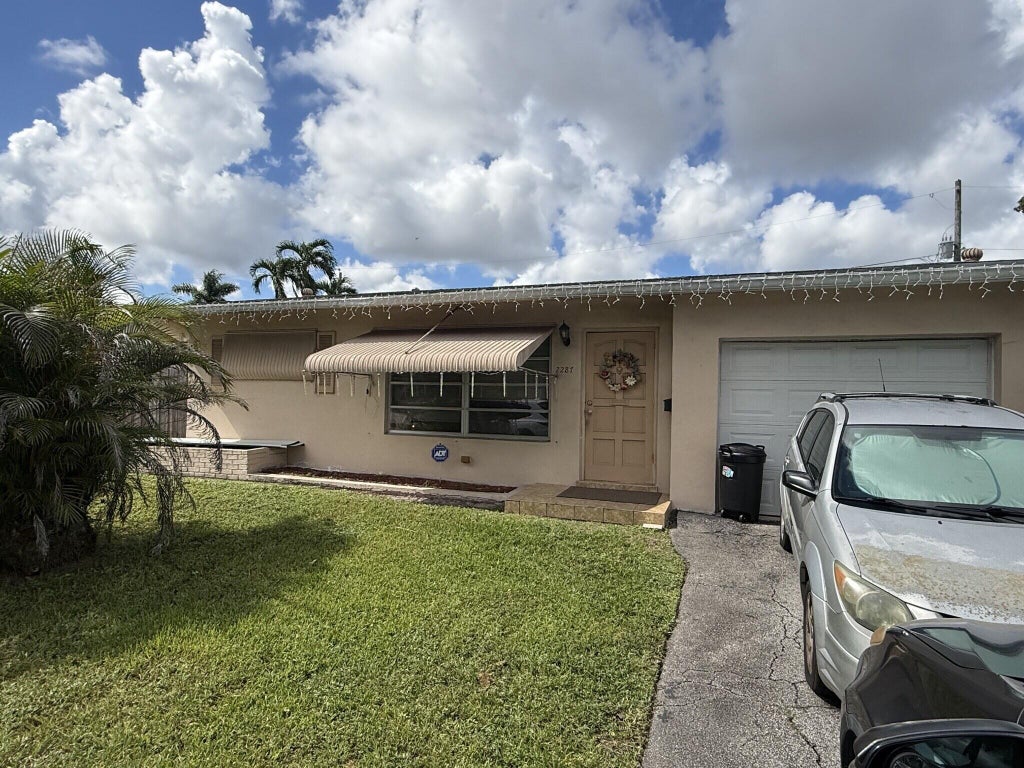 Photo of 2287 NW 81ST Avenue, Sunrise, FL 33322 (MLS # B26088901)