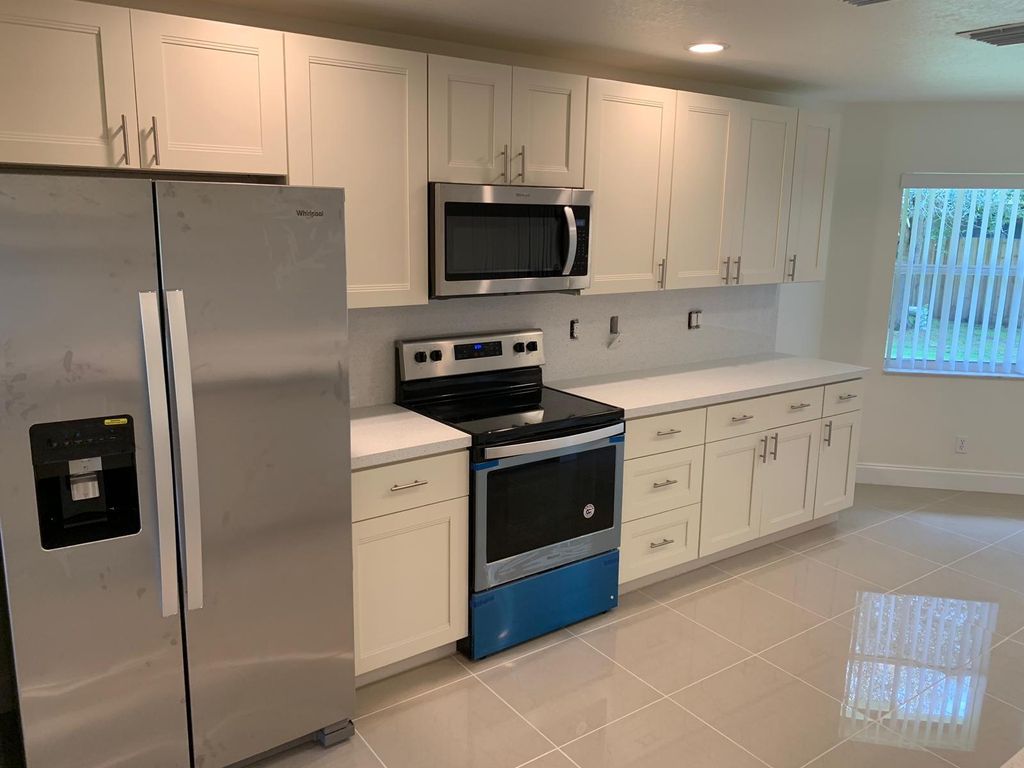 Photo of 2282 SW Natema Road, Port Saint Lucie, FL 34953 (MLS # F10527339)