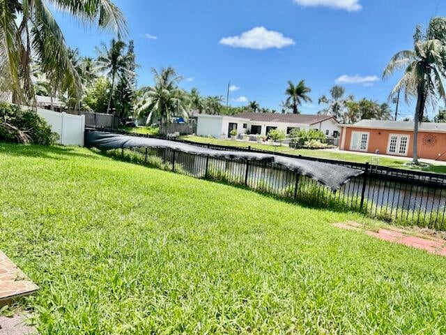 Photo of 1912 NW 38th Street, Oakland Park, FL 33309 (MLS # B26038530)