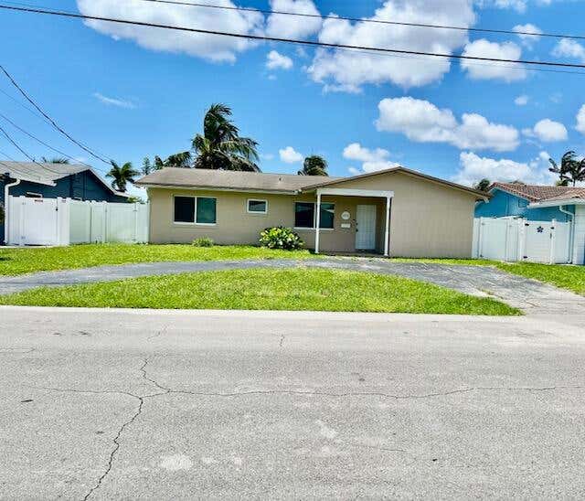 Photo of 1912 NW 38th Street, Oakland Park, FL 33309 (MLS # B26038530)