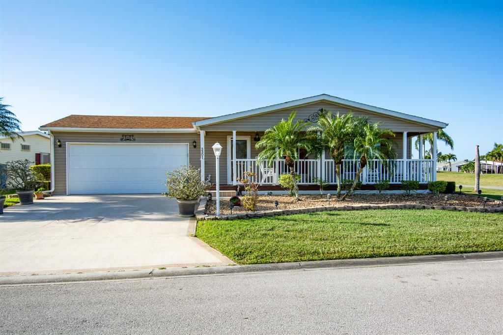 Photo of 3301 Crabapple Drive, Port Saint Lucie, FL 34952 (MLS # R10865887)