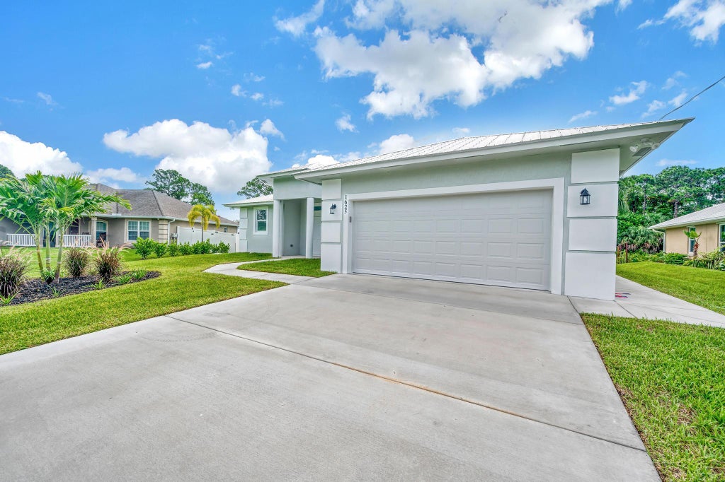 Photo of 1625 SW Chicory Terrace, Port Saint Lucie, FL 34953 (MLS # R11000547)