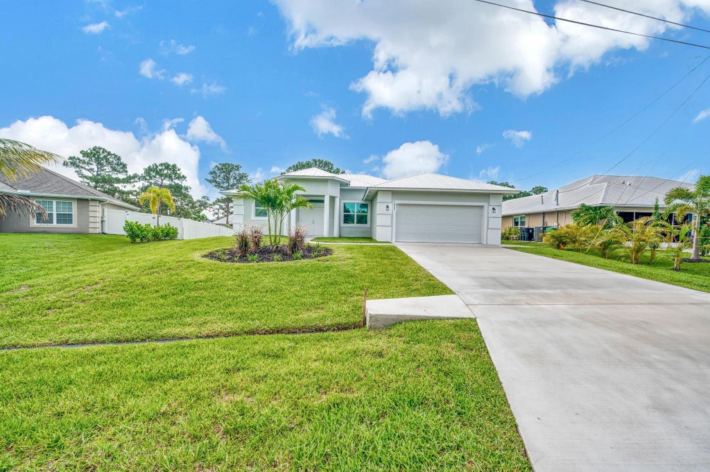 Photo of 1625 SW Chicory Terrace, Port Saint Lucie, FL 34953 (MLS # R11000547)