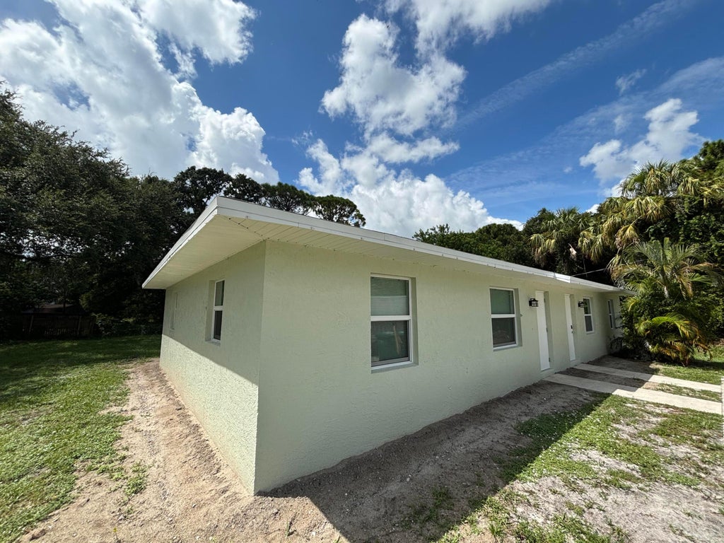 Photo of 2147 Sibley Avenue, Fort Pierce, FL 34982 (MLS # B26078972)