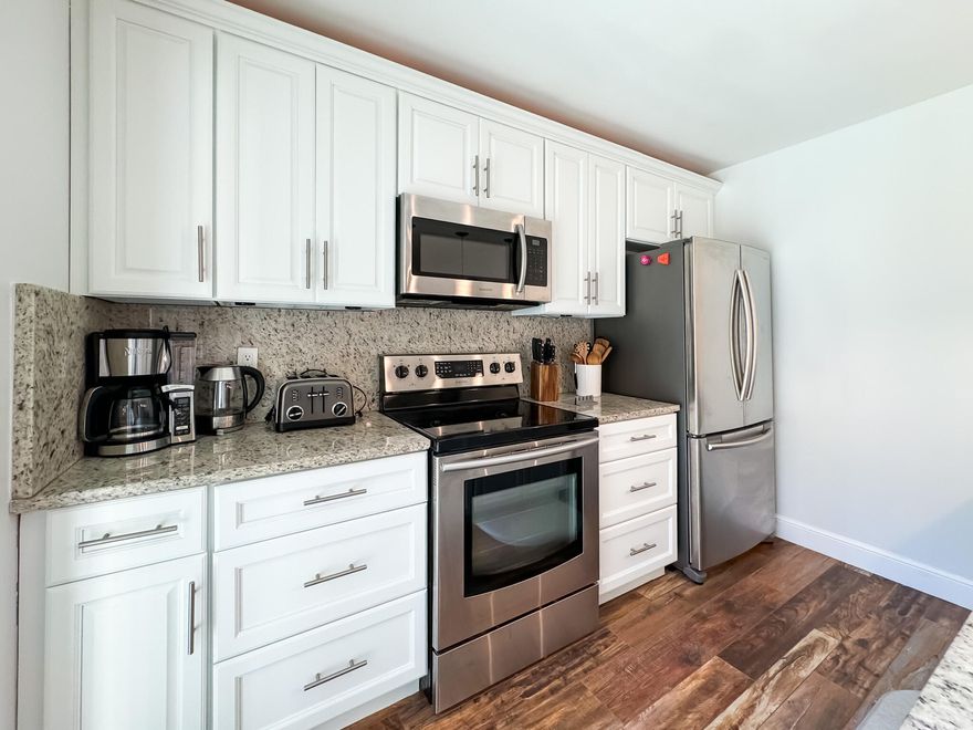 Welcome to your perfect retreat in this beautifully remodeled 2-bedroom, 2.5-bathroom townhome! Tastefully furnished with brand-new furniture, the home offers a king-size bed in the primary suite and a second bedroom with both a queen bed and twin bunk beds, pullout couch in living room, ideal for guests. Each room is equipped with a TV for your comfort and entertainment. Enjoy the privacy of your own fenced courtyard--perfect for grilling, dining, or simply relaxing outdoors. Outdoor furniture and grill. Located just 5 minutes from the beach, this community has it all--Olympic-size pool, tennis and pickleball courts, basketball, and scenic walking/biking paths. Enjoy the convenience of nearby shopping, dining, and entertainment. This is Jupiter living at its best!