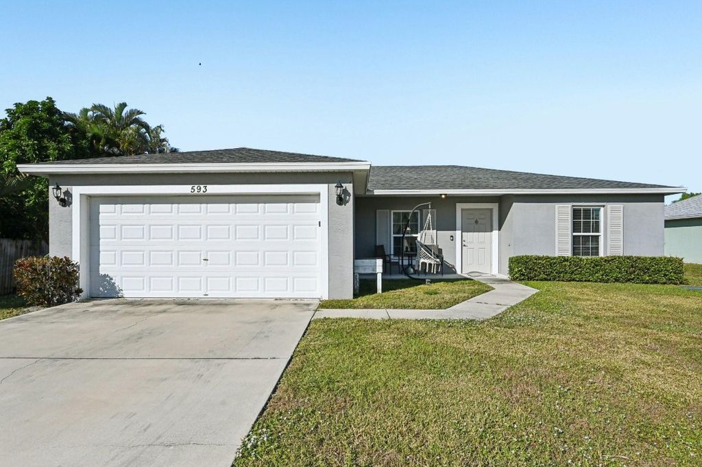 Photo of 593 NW Avon Avenue, Port Saint Lucie, FL 34983 (MLS # F10539388)