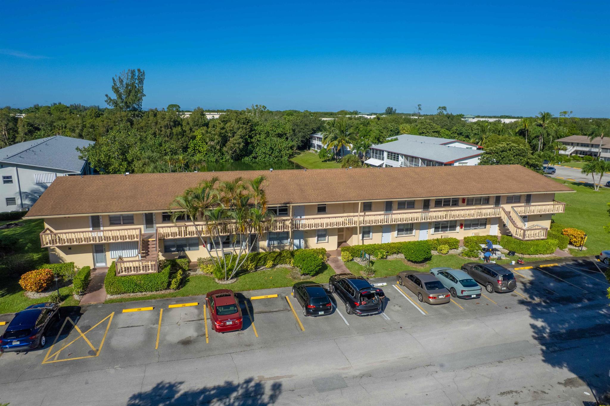 Welcome to Century Village, a vibrant 55+ community in the heart of West Palm Beach! This fully renovated 1-bedroom, 1-bath condo is move-in ready and beautifully upgraded throughout. Enjoy brand-new flooring, fresh interior paint, a modern remodeled bathroom, and a sleek open-concept kitchen featuring a large center island with a waterfall countertop--perfect for dining and entertaining. The kitchen also includes new cabinetry, quartz counters, and stainless-steel appliances (approximately 1 year old).Natural light fills the living area, and the spacious bedroom opens to a peaceful screened patio overlooking the lake, offering tranquil views and a relaxing outdoor space. Additional features include accordion shutters on all windows and a community roof installed in 2021 for added
