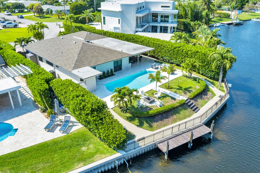 Photo of 7730 Beta Circle E, Lake Clarke Shores, FL 33406 (MLS # R11133121)