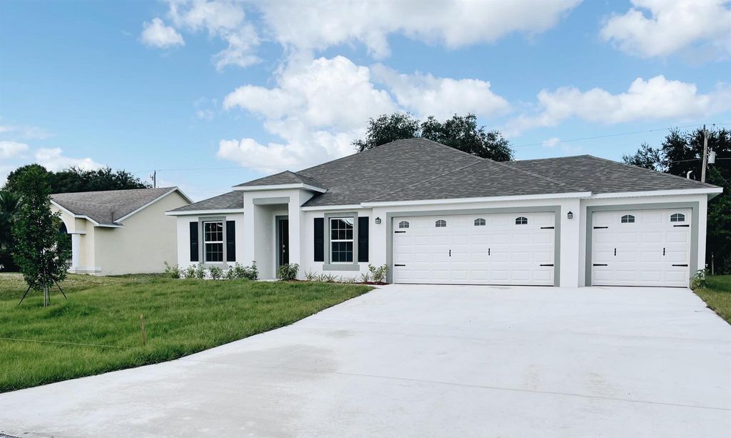Photo of 1441 SW San Esteban Avenue, Port Saint Lucie, FL 34953 (MLS # R10973491)