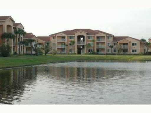 A first floor lake view one bedroom condo recently upgraded. with over 800 sq st of living space residing in a gated community with resort style amenities. Enter this elegant unit with light soft paint palette that blend perfectly with the new wood like flooring in living area. Be Enjoy the new kitchen with 42 in wood cabinets and stone quartz countertops that invite you to share a great meal with friends.A cozy large bedroom and walk in closet with new carpeting for those winter nights. Enjoy a cool drink while sitting in your private patio with serene views of the lake. Be the first to enjoy this upgraded condo.