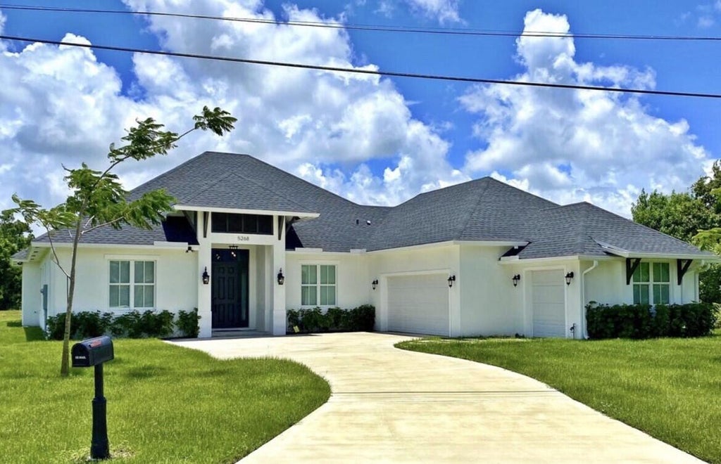 Photo of 5268 NW Gamma Street, Port Saint Lucie, FL 34986 (MLS # R11029528)