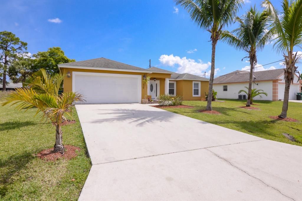 Photo of 1229 SE Wave Lane, Port Saint Lucie, FL 34983 (MLS # R10700078)