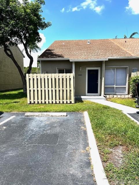 Spacious and well-maintained 3-bedroom townhome in the desirable Welleby community! This home features an updated kitchen, brand-new AC, tiled floors throughout, and a versatile separate den—perfect for a home office or playroom. Enjoy the convenience of an in-unit washer and dryer, a private fenced yard, and ample natural light. Community amenities include a pool, tennis courts, and a play area. Just a short walk to Welleby Park and minutes from Sawgrass Mills, schools, dining, and major highways. A great place to call home in a prime Sunrise location!