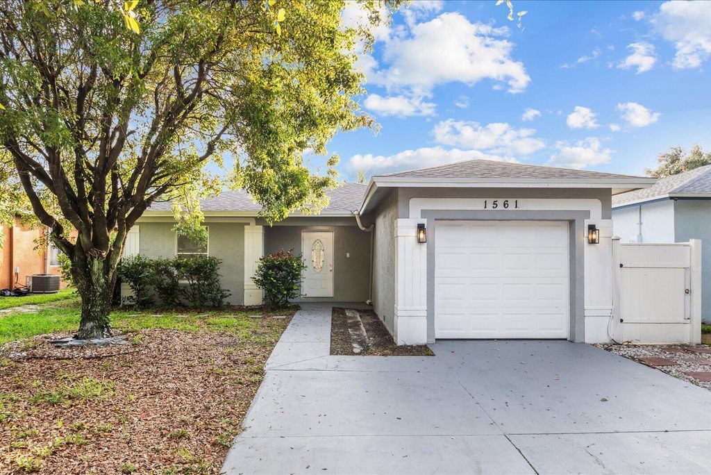 Photo of 1561 NW 7TH Lane, Pompano Beach, FL 33060 (MLS # B26053849)