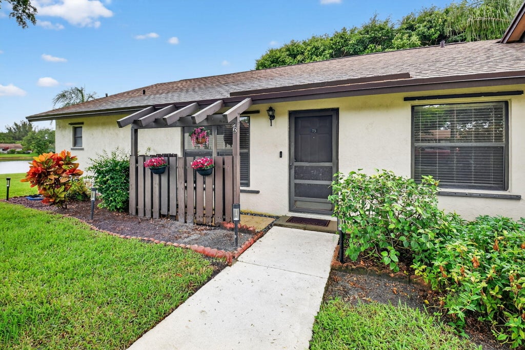 Photo of 73 Via De Casas Norte, Boynton Beach, FL 33426 (MLS # R11132808)