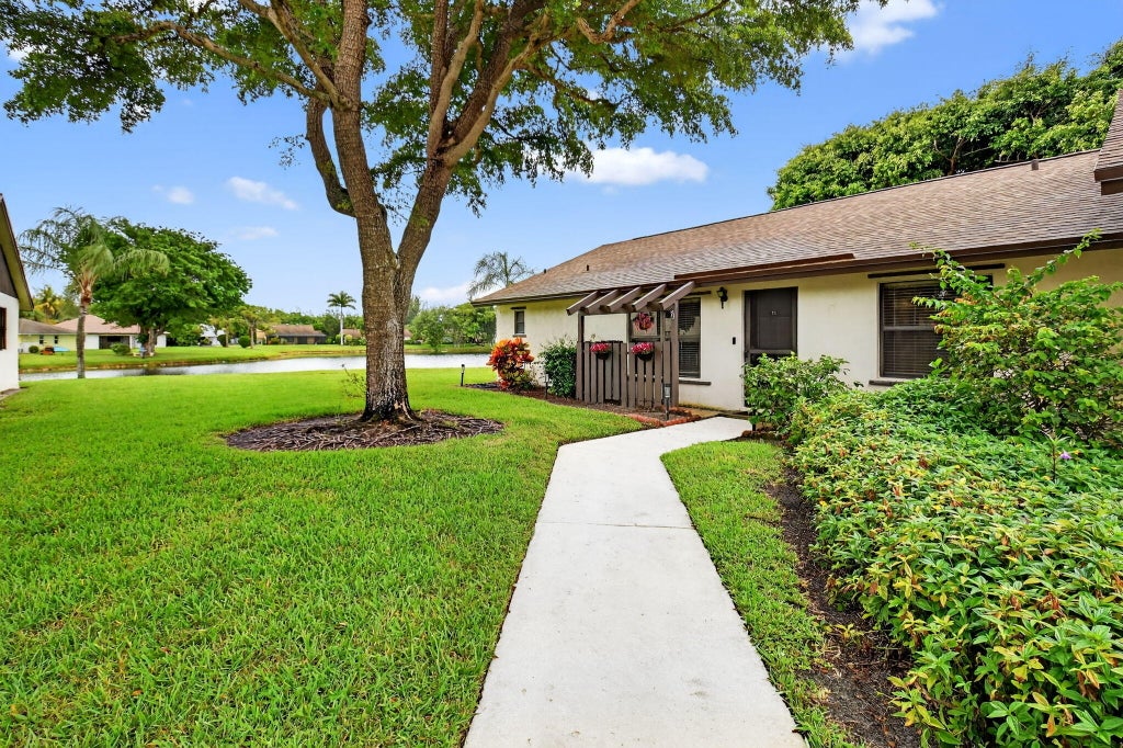 Photo of 73 Via De Casas Norte, Boynton Beach, FL 33426 (MLS # R11132808)
