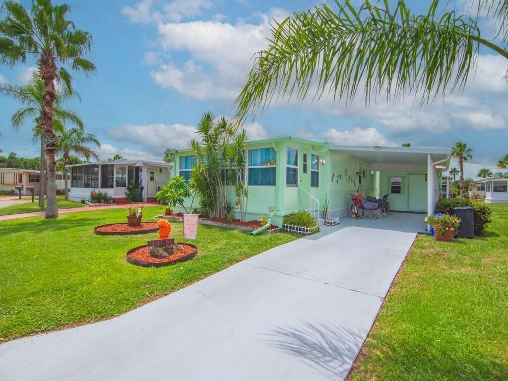 Photo of 9 SE Kassaba Lane, Port Saint Lucie, FL 34952 (MLS # R11121659)