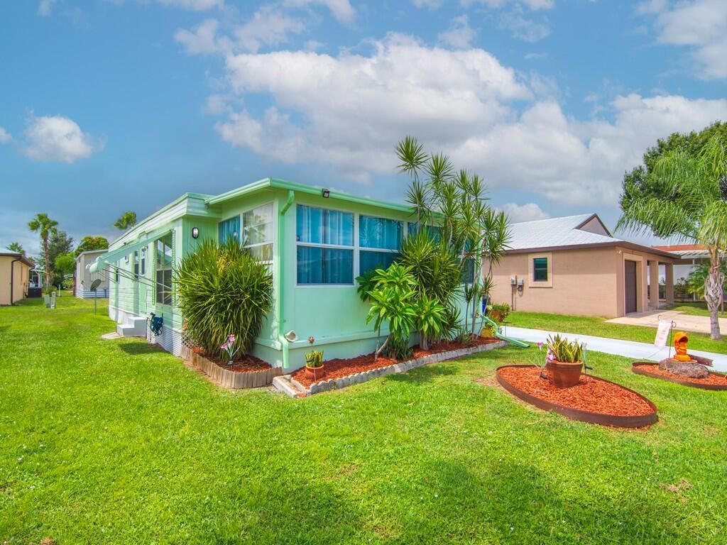 Photo of 9 SE Kassaba Lane, Port Saint Lucie, FL 34952 (MLS # R11121659)