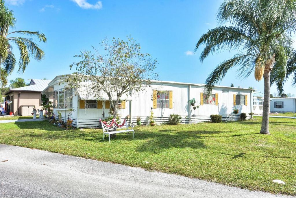 Photo of 1 Juan Carlos Lane, Port Saint Lucie, FL 34952 (MLS # R11064663)