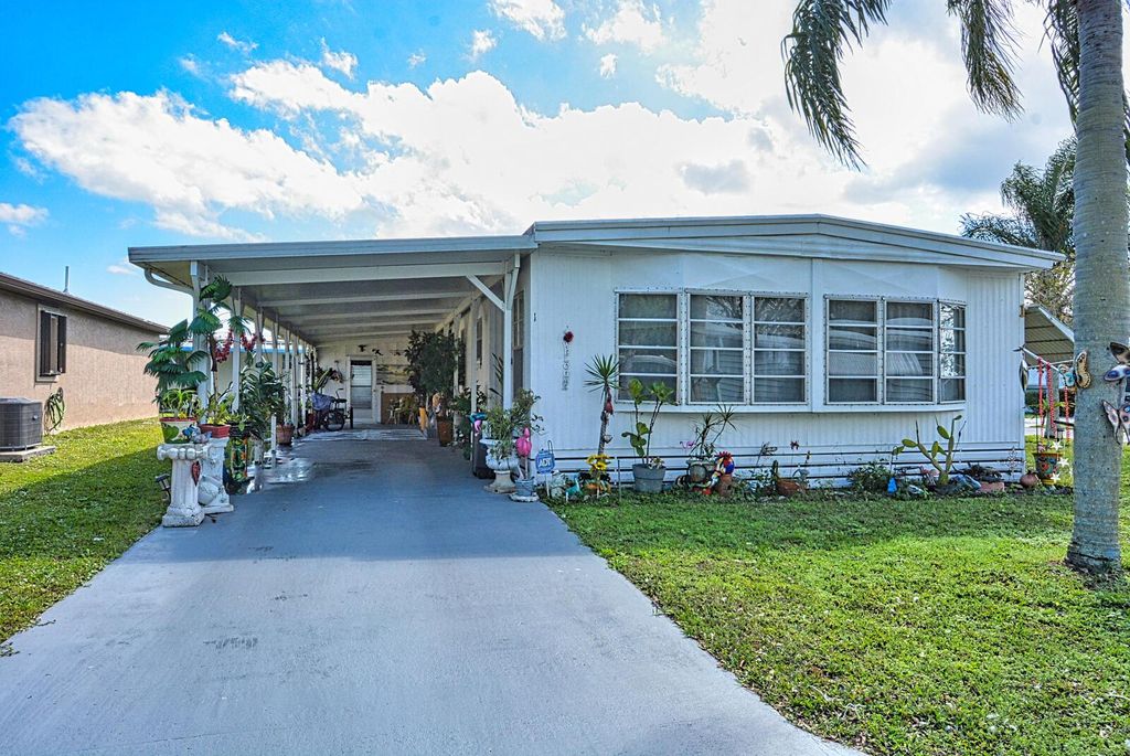 Photo of 1 Juan Carlos Lane, Port Saint Lucie, FL 34952 (MLS # R11064663)