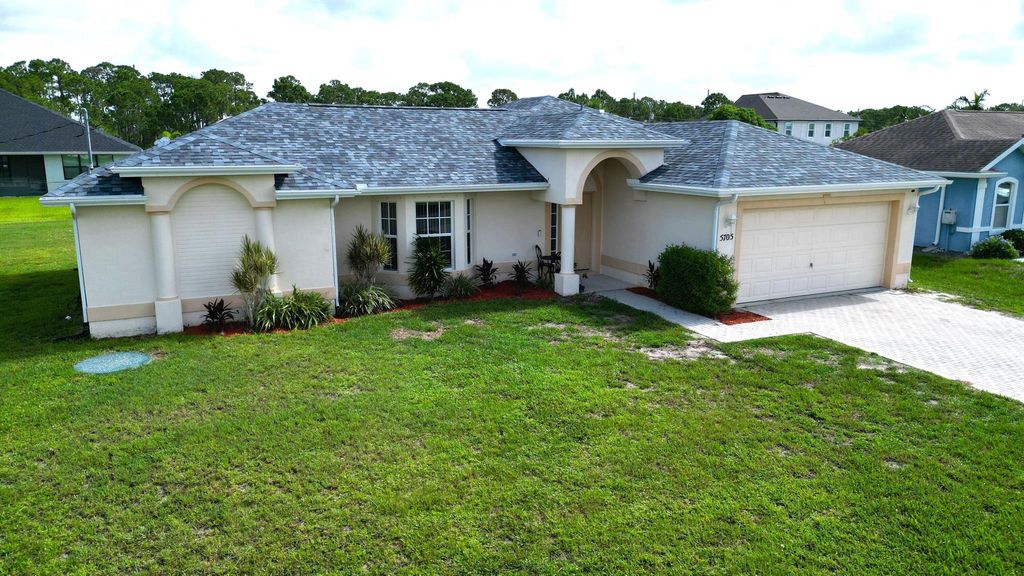 Photo of 5705 NW Crocus Avenue, Port Saint Lucie, FL 34986 (MLS # R11103292)