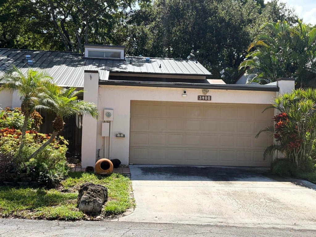 Photo of 3408 ROSE HILL Way #143, Lauderhill, FL 33319 (MLS # B26072823)