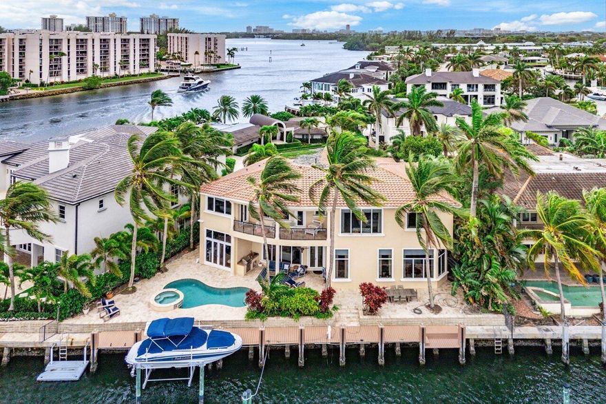 Fabulous Intracoastal Views!! 115' of deepwater for large yachts!Great open floor plan with the highest quality finishes. All impact windows & doors, heated pool and spa..  Gourmet kitchen, stainless steel appliances. Double sub zero, 48'' natural gas oven and Chef's Island. All granite counters and custom wood cabinetry. Butlers pantry. Wet Bar. All leading to a huge family room with water views. Grand master suite with his & her baths, morning kitchen, large closets. Large veranda overlooking pool and intracoastal.  Grand formal living room with gas fireplace. Theater room can convert to 6th Bedroom.
