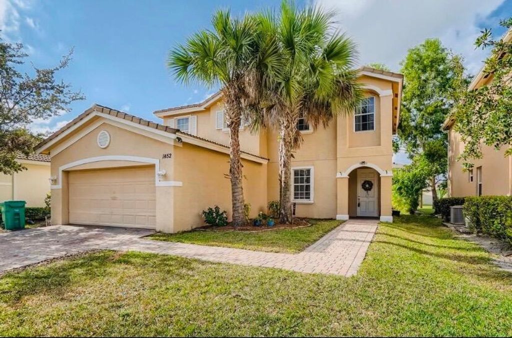 Photo of 1452 NW Leonardo Circle, Port Saint Lucie, FL 34986 (MLS # R11135705)