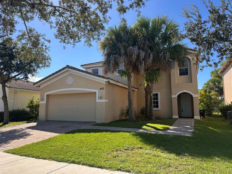 Step inside this beautifully maintained home located in a desirable gated community in Port St. Lucie. This residence offers the perfect blend of comfort and functionality, featuring a spacious open-concept layout ideal for modern living and entertaining. The kitchen seamlessly connects to the dining and living areas, creating a warm and inviting atmosphere for gatherings.Enjoy a low-maintenance lifestyle with resort-style amenities including a sparkling pool, clubhouse, fitness center, tennis and basketball courts, and a playground. Conveniently located near I-95, Crosstown Parkway, Tradition, shopping, dining, and top medical facilities like Cleveland Clinic.This home is move-in ready and perfectly positioned for easy living and convenience.