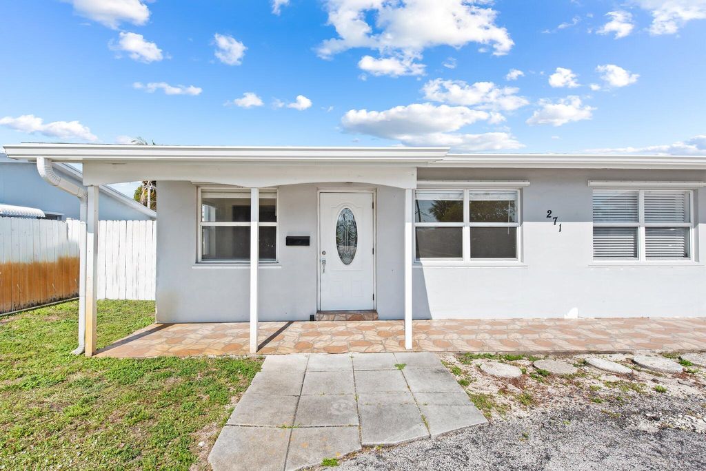 Photo of 271 NE 57th Ct #1-2, Oakland Park, FL 33334 (MLS # B26017799)