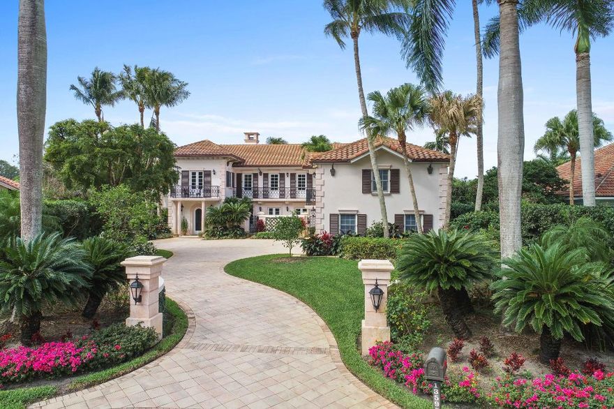 This exquisite waterfront residence offers modern classic design amid beautiful inviting tropical landscaping with scenic water views. The distinctive stately foyer boasts impressive lofty ceiling height as it opens to the expansive great room.  Design highlights include, limestone floors accented by marble borders, Cypress beamed ceilings, a magnificent fire place and gorgeous French doors throughout. (See More Remarks) This exquisite waterfront residence offers modern classic design amid beautiful inviting tropical landscaping with scenic water views. The distinctive stately foyer boasts impressive lofty ceiling height as it opens to the expansive great room. Design highlights include, limestone floors accented by marble borders, Cypress beamed ceilings, a magnificent fire place and gorgeous French doors throughout. Additional features include a completely renovated kitchen in 2015,completely retiled roof (2015),Lutron lightening in the primary rooms and second level hardwood floors have been sanded and resurfaced. A unique downstairs Queen's Suite offering a library with a his & hers bath. The additional Master Suite is located on the second floor and also offers a library and a his & hers bath. The 4 guest suites, each with private baths are completely separate providing for ultimate privacy. Extraordinary outdoor living includes an increased and refurbished dock in 2015. The exceptional loggia overlooks the rock waterfall and inviting recently resurfaced gas heated custom pool & spa. Complete mosquito misting system installed in the backyard makes for comfortable enjoyment along 164' water frontage providing Intracoastal and Ocean access. Florida living at it's finest.