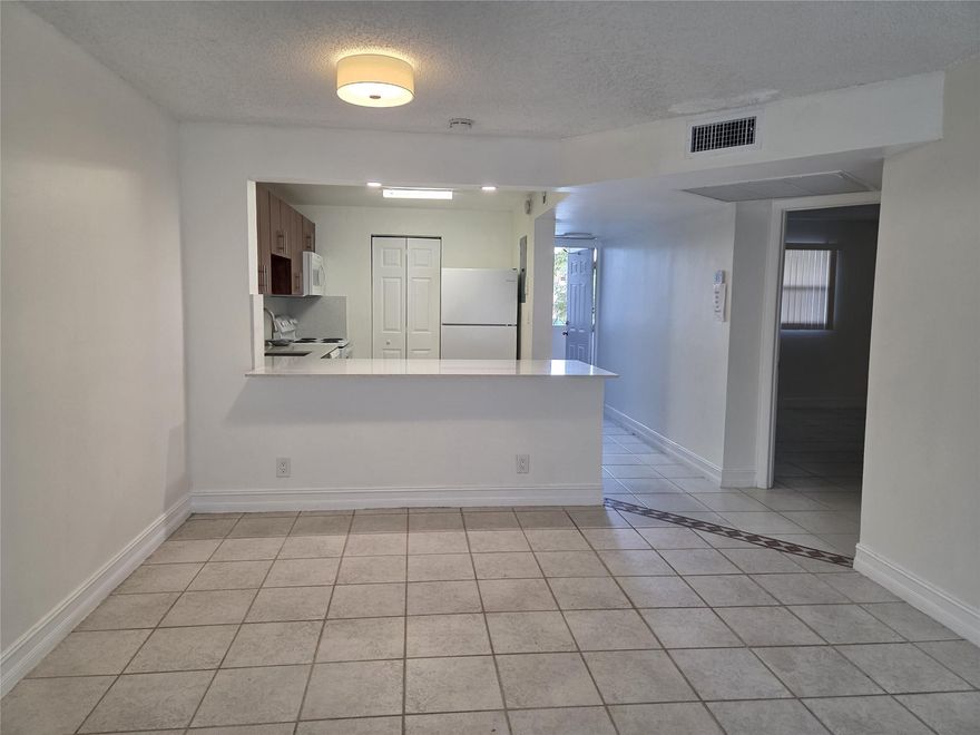 Only 1st month’s rent + security deposit! Move-in ready lovely & bright 2/2 unit on 1st floor. Bedrooms with spacious walking closets and renovated bathrooms. Spacious open kitchen with new Quarz countertop. New light fixtures & ceiling fans. All tiled floors. NO carpet. No washer/dryer – Hook up available. Laundry facility on 3rd floor of building. Screened patio with water view. NO Pets. Max occupancy is 4 occupants, children included. *Association requires 625+ resident score. Each unit is allowed a max of 2 vehicles. Commercial vehicles are permitted but must adhere to the 2-vehicle limit per unit. Semi-trucks or any trucks that cannot fit within the designated commercial parking spaces will not be allowed. Conveniently located close to shopping, dining, schools, major roads, highways.