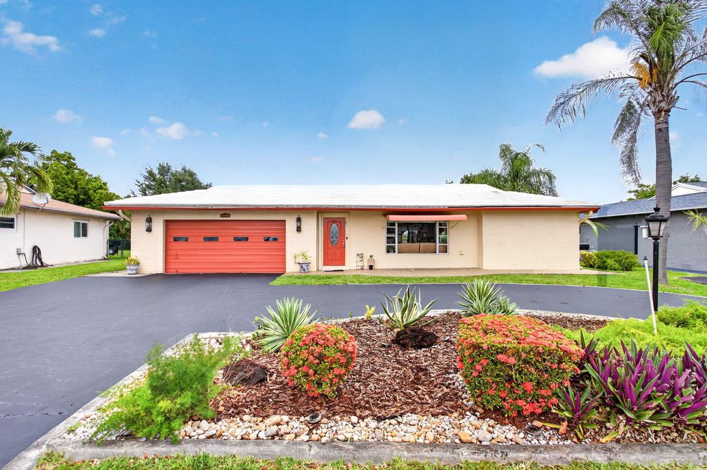 Photo of 7306 NW 94th Way, Tamarac, FL 33321 (MLS # B26031202)