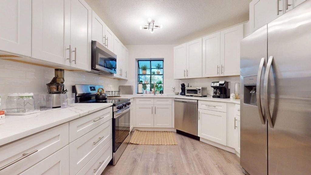 Photo of 5205 Brisata Circle #D, Boynton Beach, FL 33437 (MLS # R11152252)