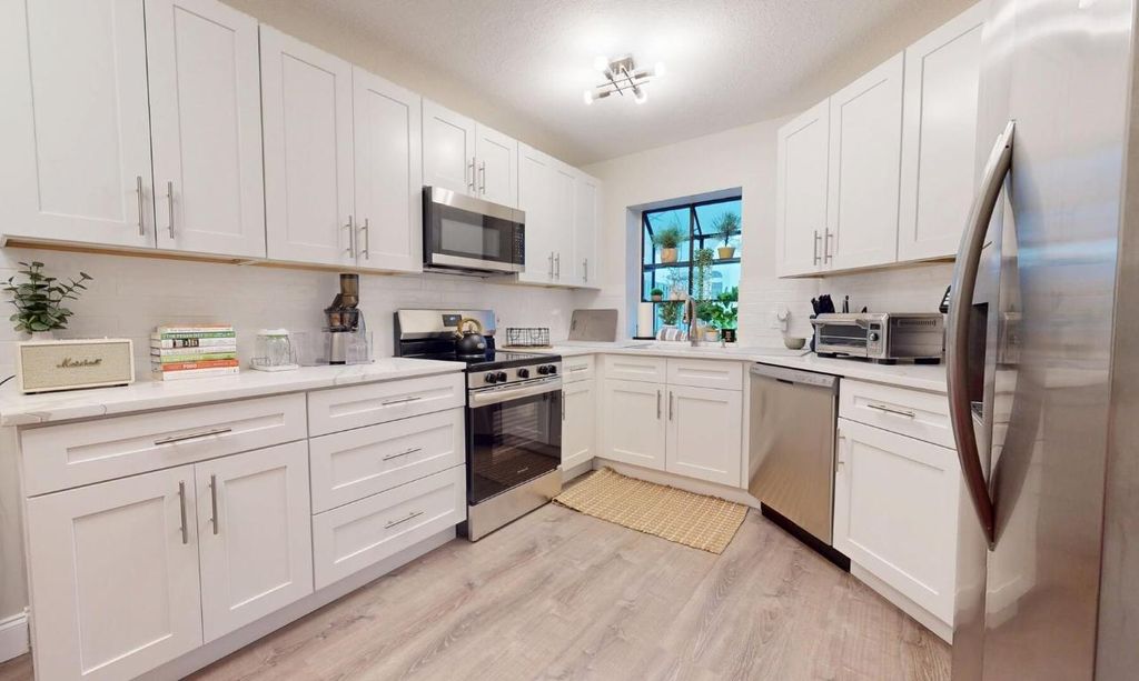 Photo of 5205 Brisata Circle #D, Boynton Beach, FL 33437 (MLS # R11152252)