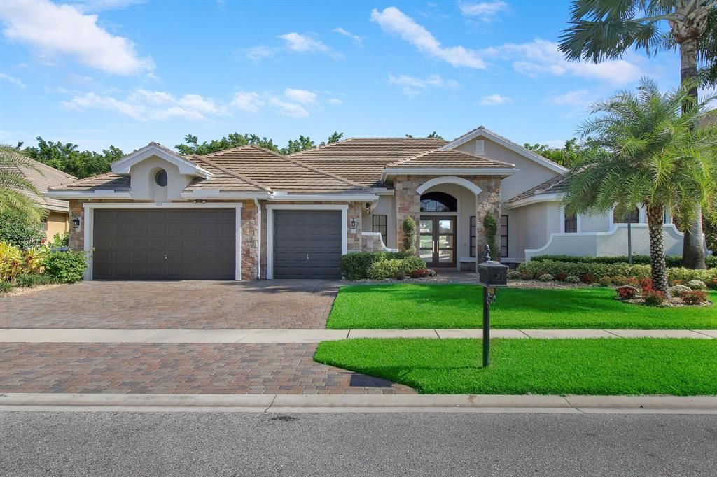 Photo of 10718 Versailles Boulevard, Wellington, FL 33449 (MLS # R10884445)
