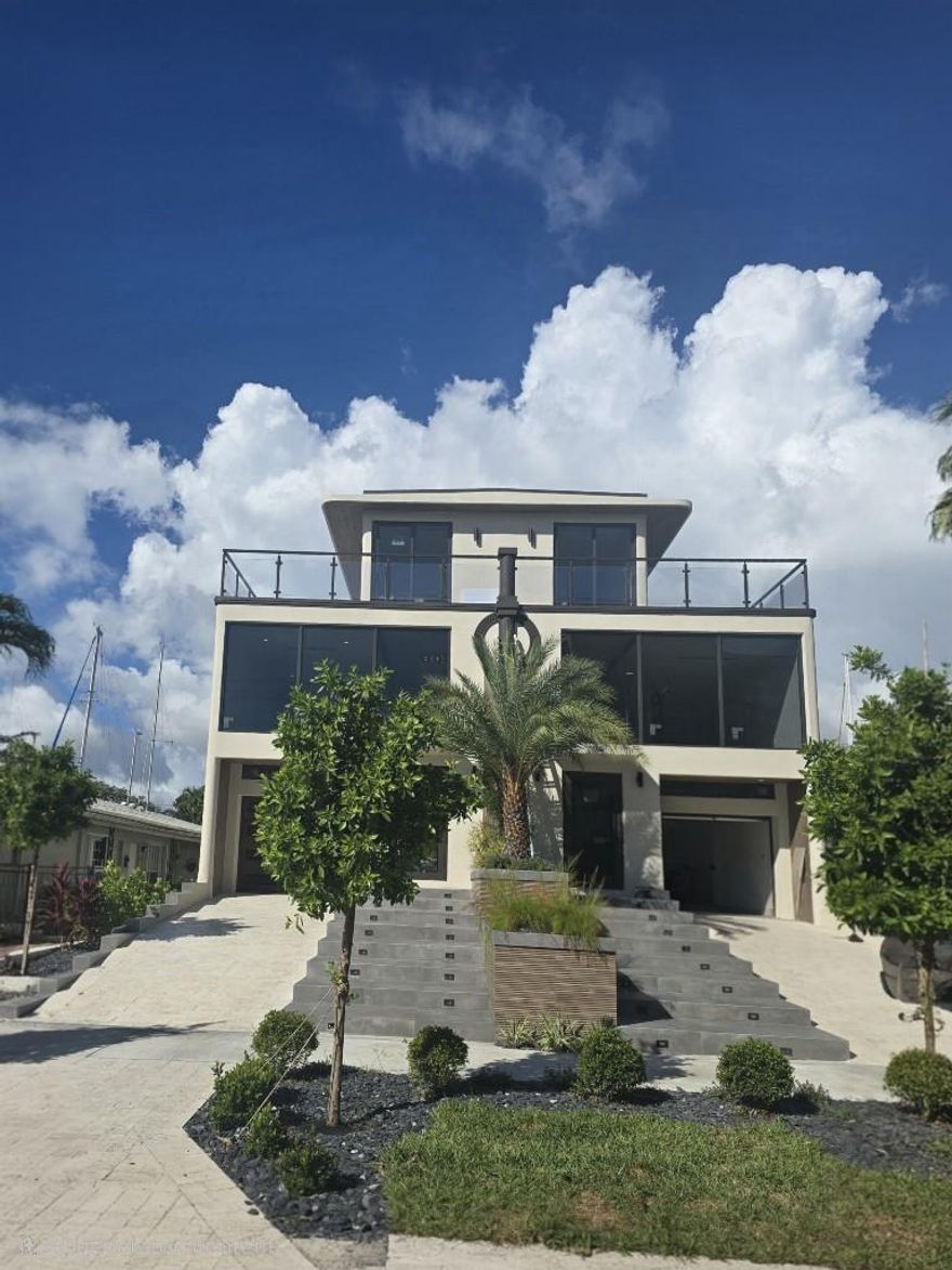 Exceptional New Construction Waterfront Duplex off Las Olas
Discover an incredible opportunity to own this breathtaking new-construction waterfront home, just steps from vibrant Las Olas Boulevard. With only two exclusive residences, this property lives like a single-family home and showcases stunning contemporary design, soaring two-story ceilings, and high-end designer finishes throughout.
Entertain with ease in the chef’s kitchen featuring a dramatic waterfall island, high end appliances, and custom cabinetry. Expansive living areas flow seamlessly to wraparound balconies on the second and third levels, offering indoor-outdoor living at its finest.